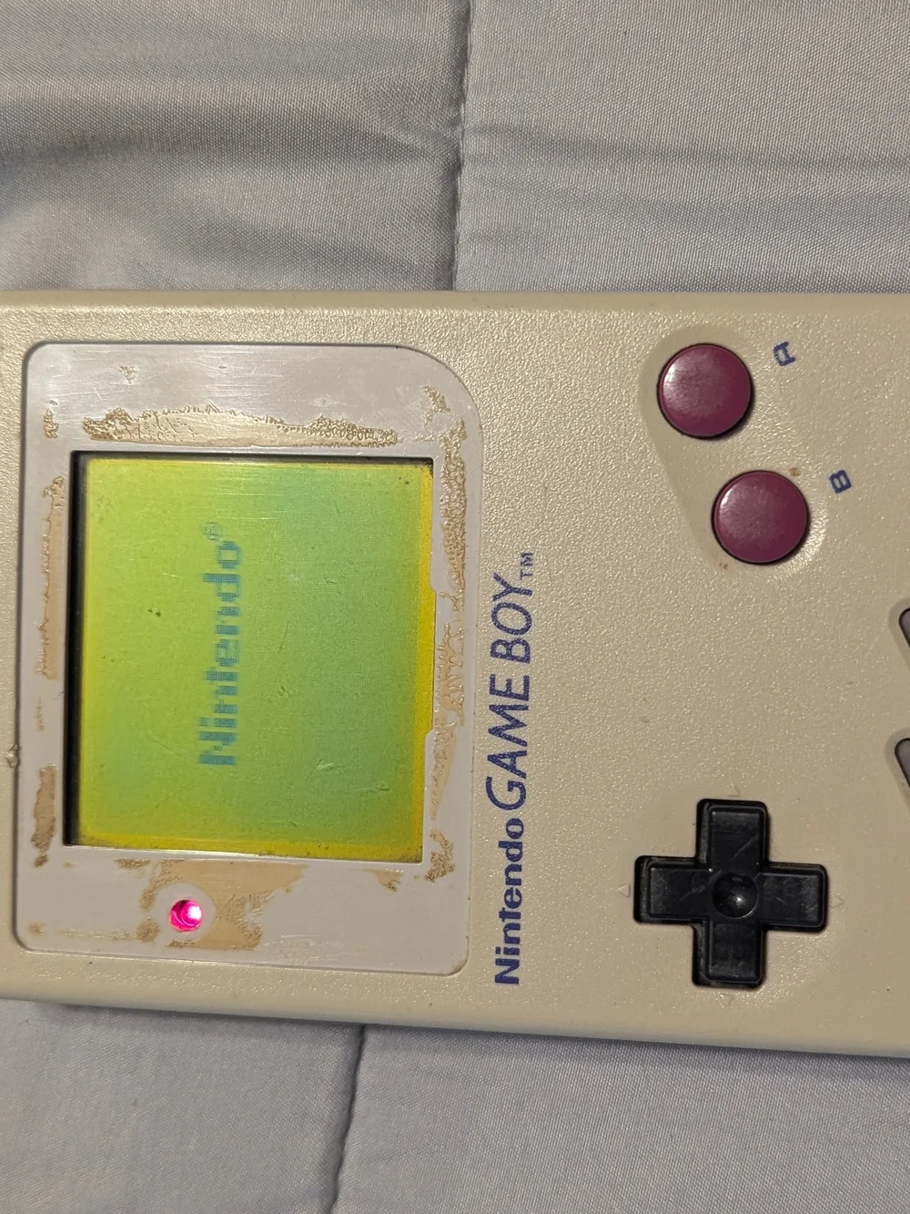 Nintendo Game Boy Portable in Cream with Purple Buttons